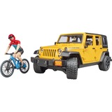 bruder Jeep Wrangler Rubicon Unlimited, Modellfahrzeug gelb/schwarz, Inkl. Mountainbike und Radfahrer