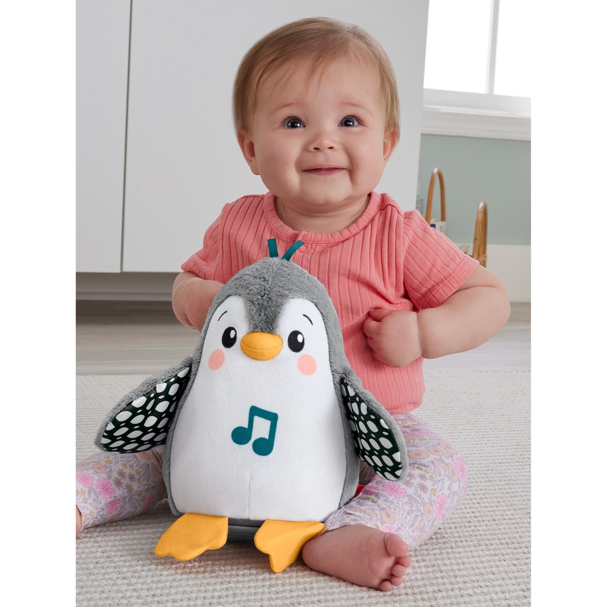 Fisher-Price Flatter & Wackel Pinguin, Kuscheltier schwarz/weiß, zum Spielen in der Bauchlage, mit Musik
